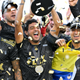 Carlos Vela of LAFC raises the MLS Cup